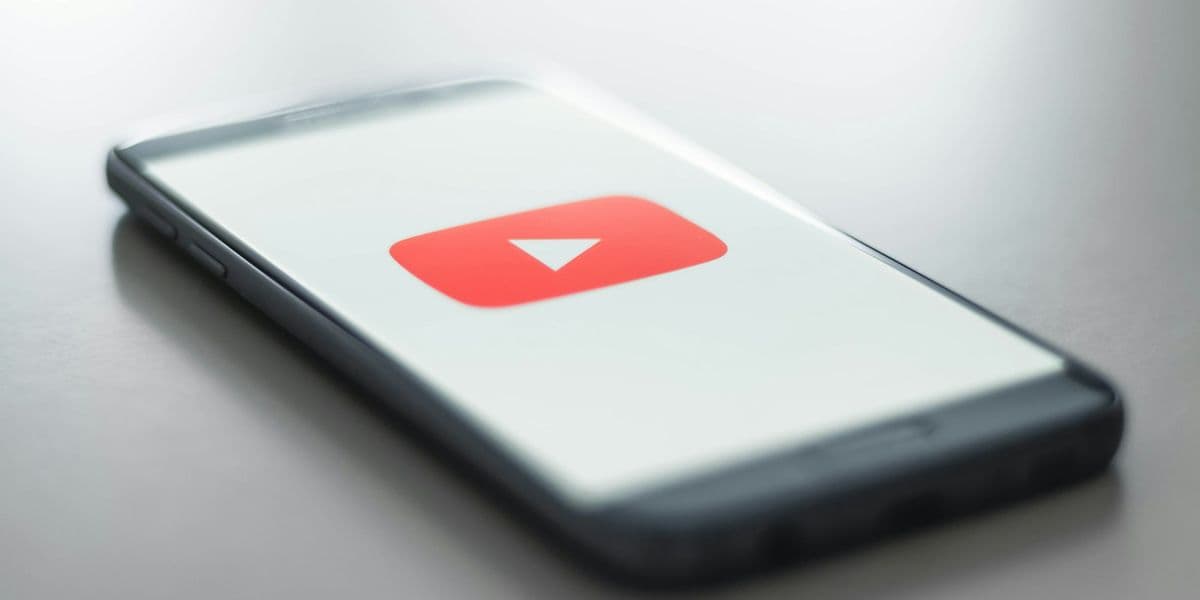 Close-up of a smartphone screen showing the YouTube app