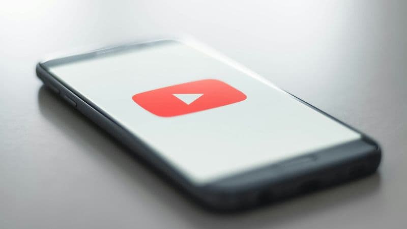 Close-up of a smartphone screen showing the YouTube app