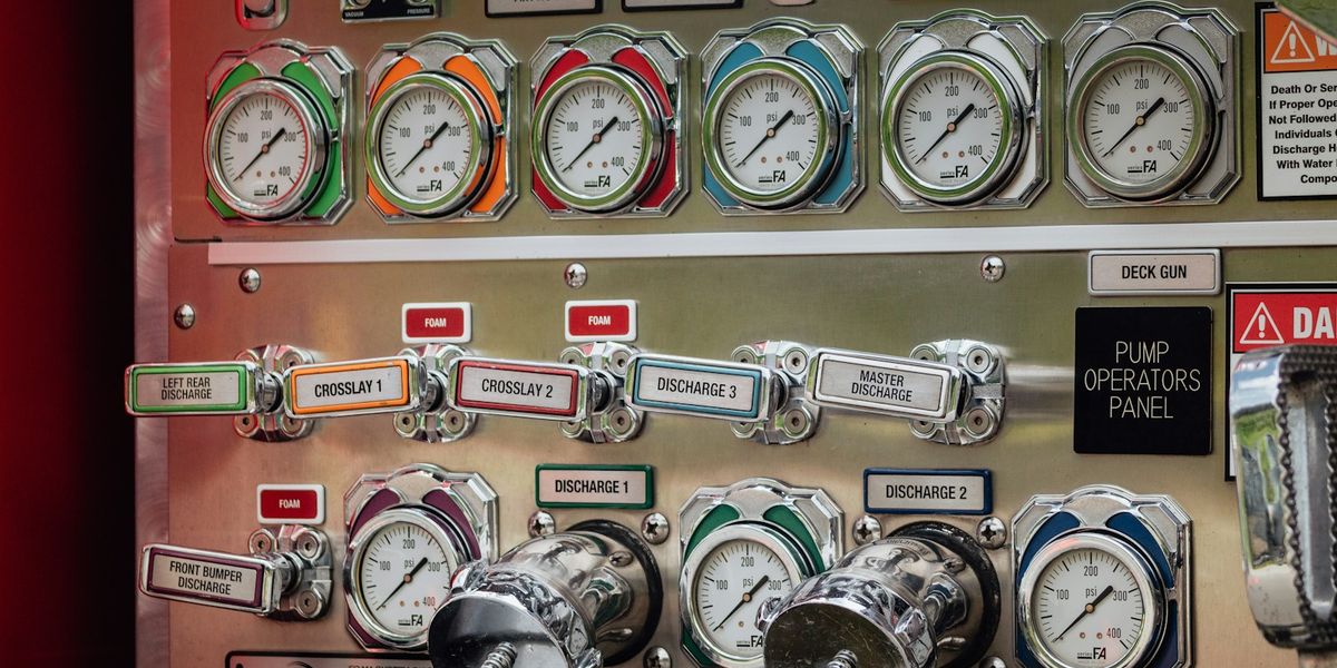 Factory machinery gauges showing production metrics